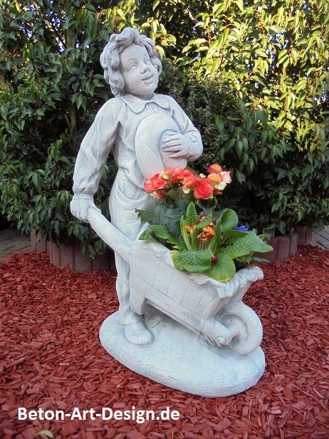 Garden Figure "Boy with a wheelbarrow" plant