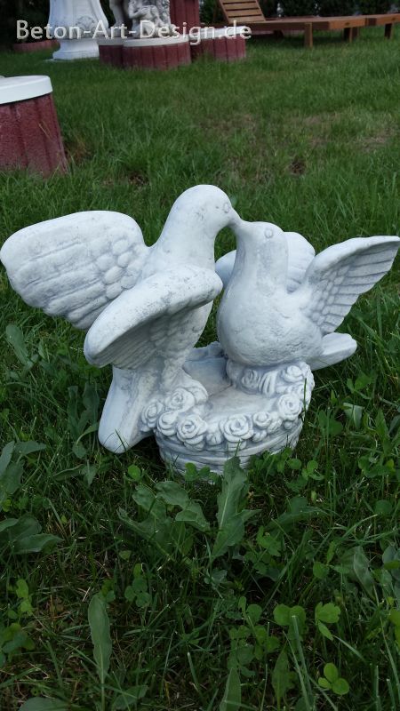 cute pair of doves "lovebirds" on flower basket